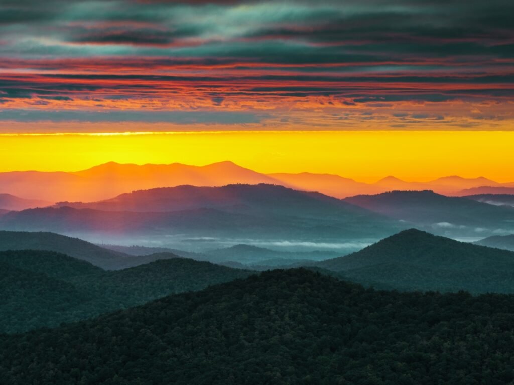 North Carolina Blue Ridge Parkway Sunrise Asheville NC ⁠Image by WerksMedia from Getty Images